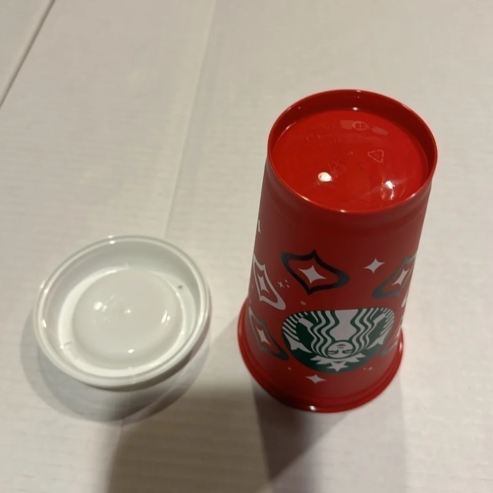 NWOT Starbucks 2023 reusable cup with red green & white colors good for refills